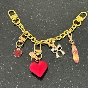 Gold Charm purse chain with Red and Gold Accents, 7” with 6 charms.